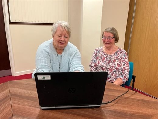 Carers at computer