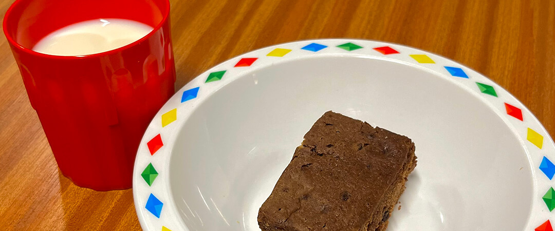 Chocolate brownie and glass of milk
