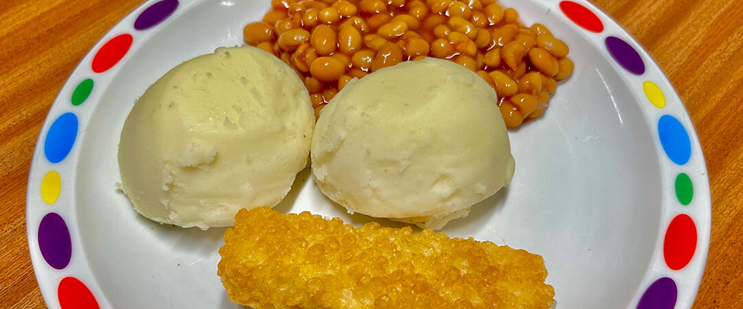 Double bubble salmon fillet* served with mashed potato and baked beans