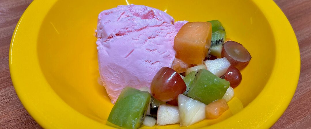 Strawberry ice-cream and fruit