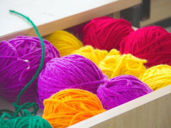 Close up view of coloured wool in a drawer (Pexels - Avni-jain)