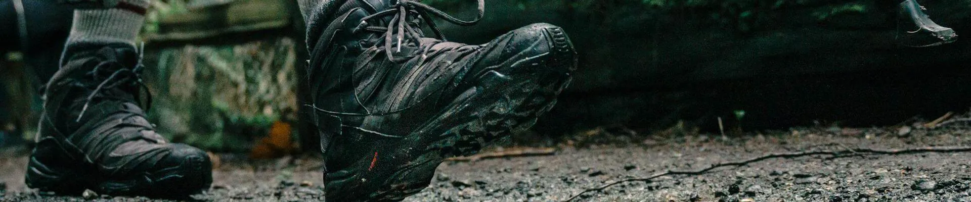 Low angle shot of a person wearing hiking shoes (Pexels - PNW Production)