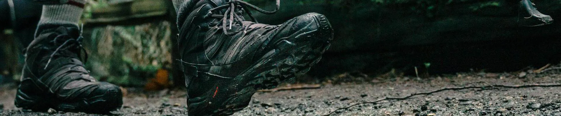 Low angle shot of a person wearing hiking shoes (Pexels - PNW Production)