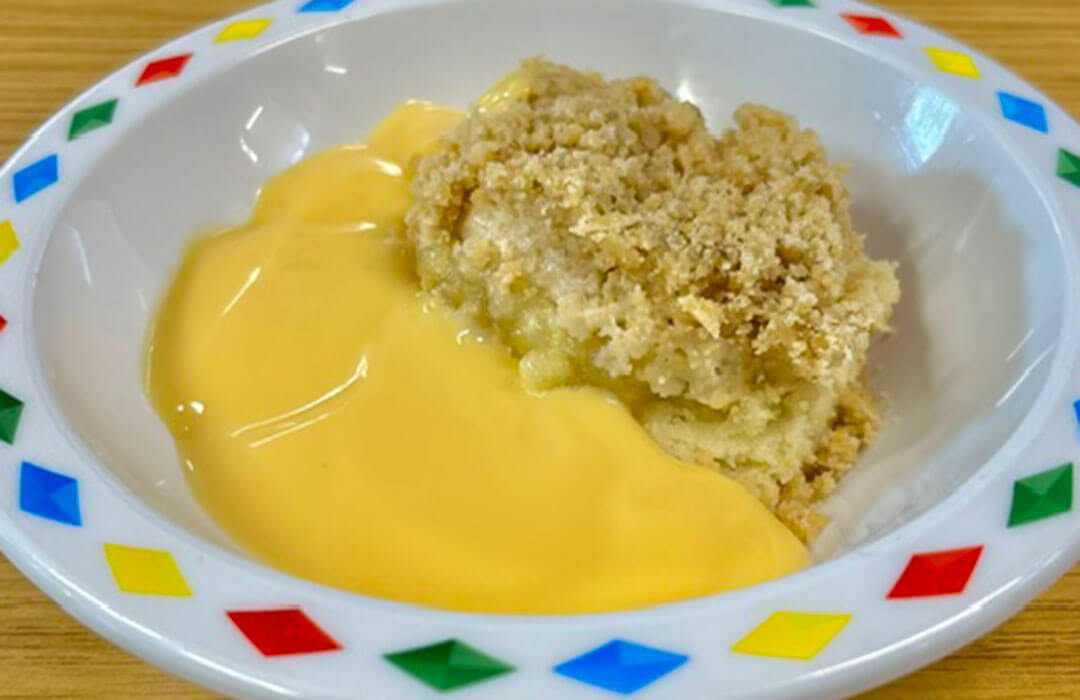 Apple crumble cake and custard