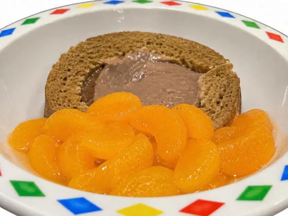 Chocolate arctic roll and mandarins