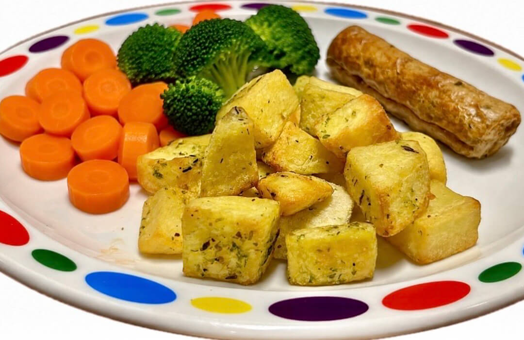 Quorn Sausage (Ve) served with herby diced potatoes, baked beans or carrots and broccoli