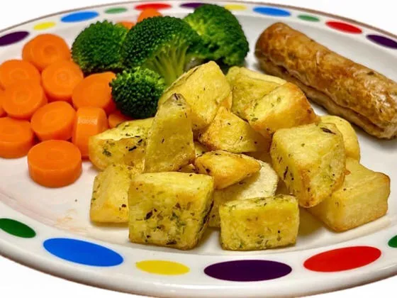 Quorn Sausage (Ve) served with herby diced potatoes, baked beans or carrots and broccoli