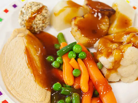 Quorn fillet (Ve) with stuffing, seasonal vegetables, roast potatoes, boiled potatoes and gravy