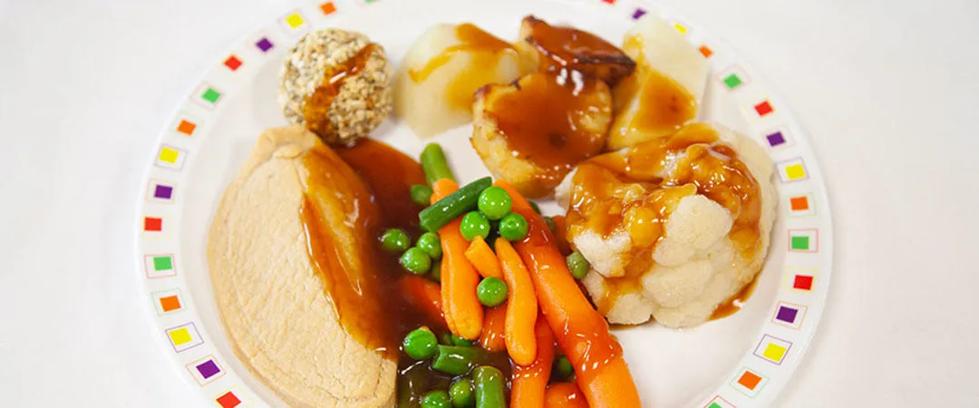Quorn fillet (Ve) with stuffing, seasonal vegetables, roast potatoes, boiled potatoes and gravy