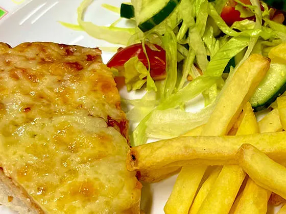 Cheese and tomato pizza served with chips and side salad