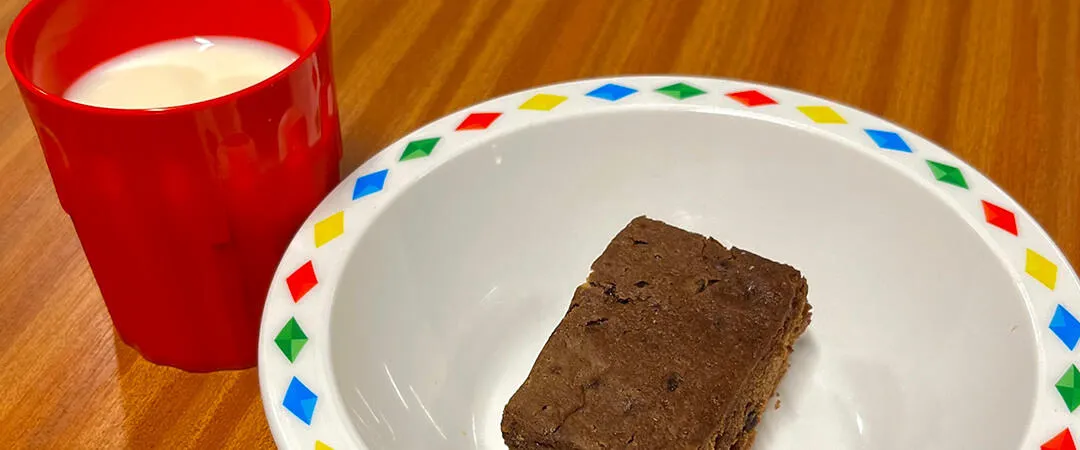 Chocolate brownie and glass of milk