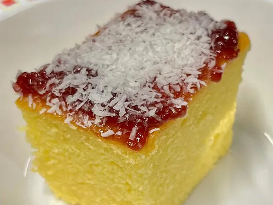 Jam and coconut sponge with custard