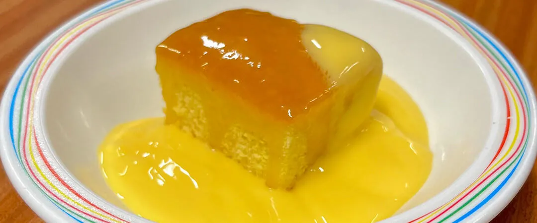 Lemon drizzle cake and custard