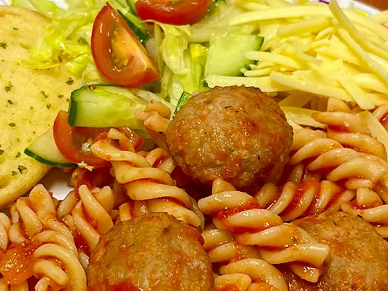 Pork and carrot meatballs in a rich tomato sauce