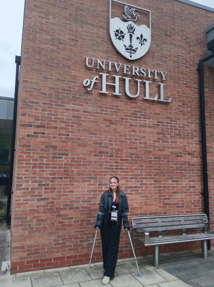 rae standing outside the university of hull 